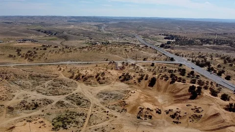 Smooth flight at high altitude over the winter desert Video stock 125330965