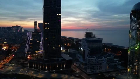 Smooth flight over the dark city at dusk Stock Footage 257466684