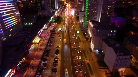 Smooth flight over night on New Arbat road and four houses - along books. Stock Footage 68177868