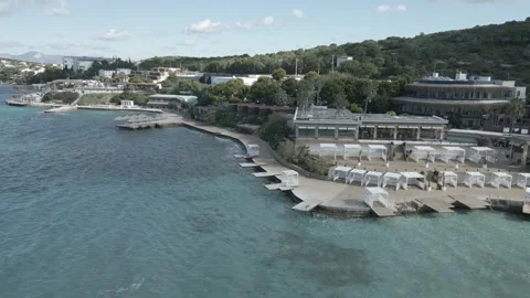 Smooth flight over the sea along the coastline on a sunny summer day Stock Footage 256158265
