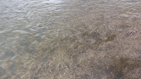 Smooth flow of transparent water in the river, natural background Stock Footage 84926614