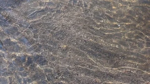 Smooth flow of transparent water in the river, natural background Stock Footage 84926672