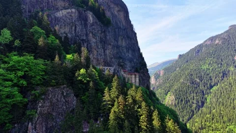 Smooth Forest Flight with Sumela Monastery and Cliff Landscape Stock Footage 340426893