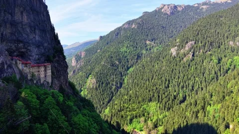 Smooth Forward Flight Through Forest with Sumela Monastery and Cliff View Vídeos de archivo 340427693