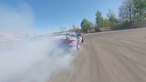 Smooth FPV Drift Battle Highlighting Chaser With Heavy Smoke Stock Footage 328472375