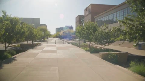 Smooth Gimbal and Dolly 4K Shot of Arizona State University Campus on a Bright Stock-Footage 290010441