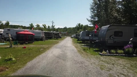 Smooth Gimbal Driving Through RV Motorhome Park Stock Footage 147390062