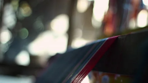 Smooth glide tracking shot over threads on traditional loom in Indian village Stock Footage 49911148