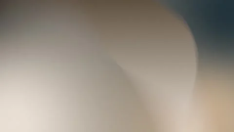 Smooth gradient with beige and blue tones, soft curved edges. Seamless loop Stock Footage 300840198