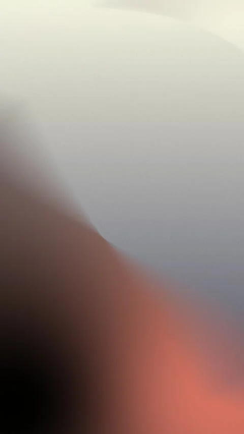 Smooth gradient blend of beige, blue, and burnt orange hues. Abstract shape. 動画素材 310143547