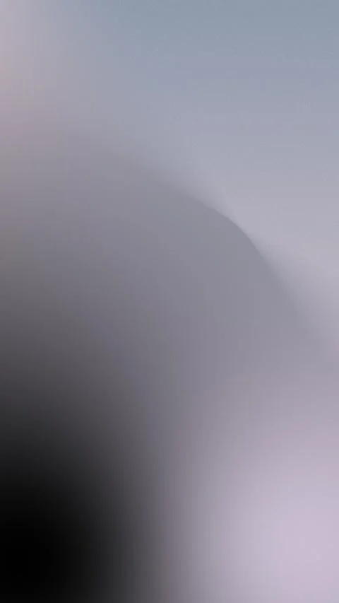 Smooth gradient of blue and teal with soft curves. Seamless loop background. 4K. Stockbeeldmateriaal 309956935