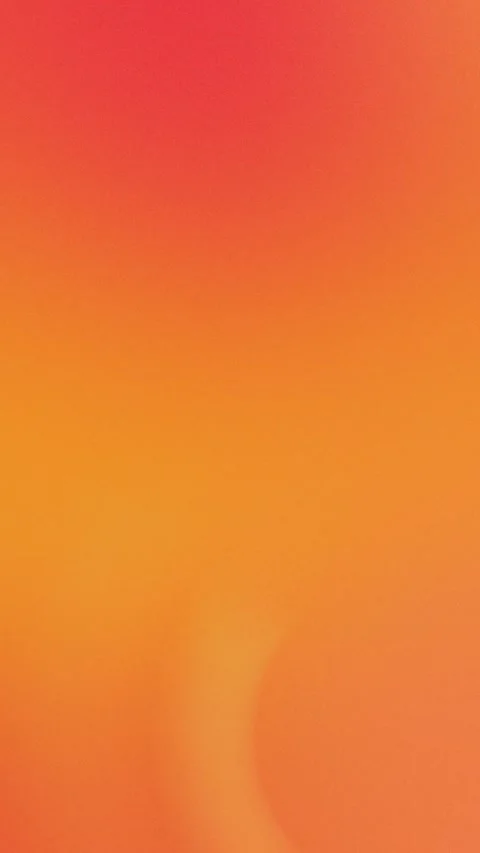 Smooth gradient of red to orange with subtle grain texture. Seamless loop Vidéo 309956904