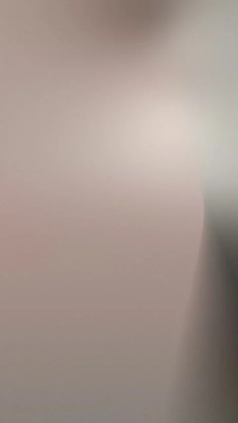 Smooth gradient with soft grey, green, and blue hues forming abstract shapes in Видео 309956404