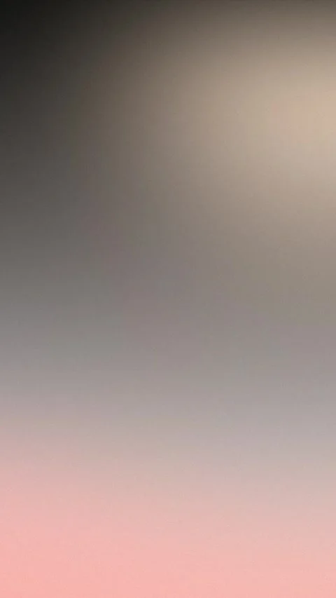 Smooth gradient with soft pink, gray, and beige tones. Seamless loop background. Stock Footage 309856208