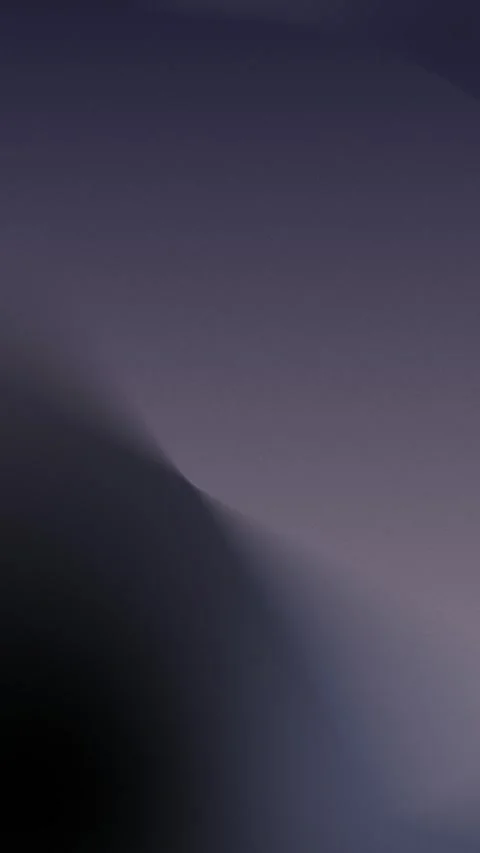 Smooth gradient of teal and mustard hues blending seamlessly. 4K loop. Stock Footage 309701507