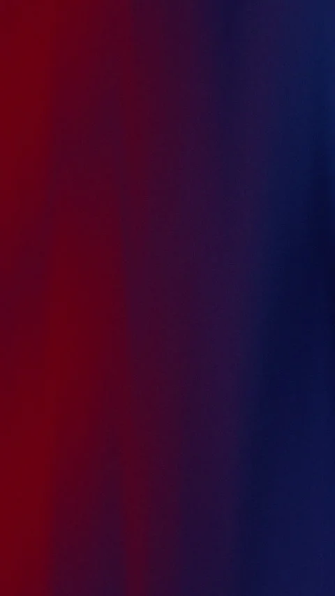 Smooth gradient transitions blend deep red to rich navy blue 動画素材 334578502