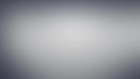 Smooth gray gradient with grain effect, seamless loop background, 4K quality. Stock Footage 310143419