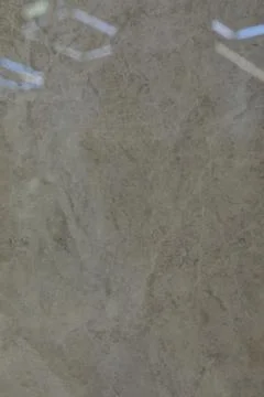 Smooth gray marble surface with subtle patterns and light reflections in a Stock Photos