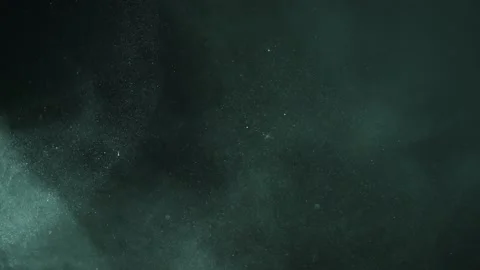 Smooth green dust particles fly in the air in slow motion 動画素材 233628509
