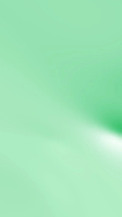 Smooth Green Gradient Background with Soft Light Effect and Subtle Movement Stock Footage 327334646