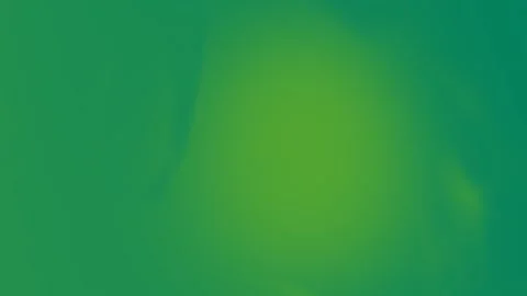 Smooth green gradient background with subtle blending and seamless loop. 4K Stock Footage 300840461
