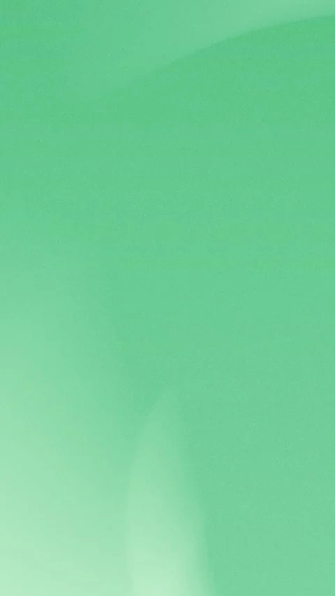 Smooth green gradient with soft curves, providing a seamless loop background. Vídeo Stock 309855973