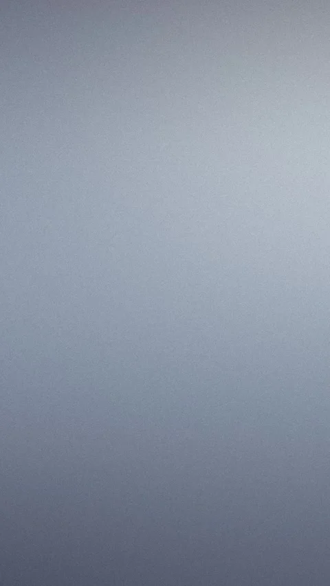 Smooth grey gradient with fine texture, seamless loop background. 4K. Vídeo Stock 309856016