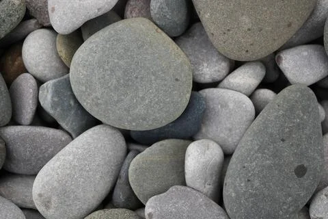 Smooth Grey Rounded Beach Pebbles And Stones In Towyn, North Wales, Uk. Stock Photos