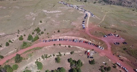 Smooth High Forward Flying Aerial View Of The People Gathering To Watch Stock Footage 99211776