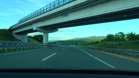 Smooth highway stretches under clear blue sky. Serbia Stock Footage 340638937
