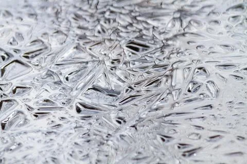 Smooth ice consisting of large crystals Stock Photos