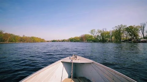 A smooth instance of a speeding boat on a bright clear morning day Stock Footage 233655788