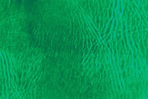 Smooth leather surface, background texture, modified color scheme. Stock Photos