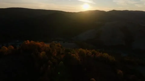 Smooth Left Rotation Drone Shot with Sunrise in Frame Stock Footage 290871105