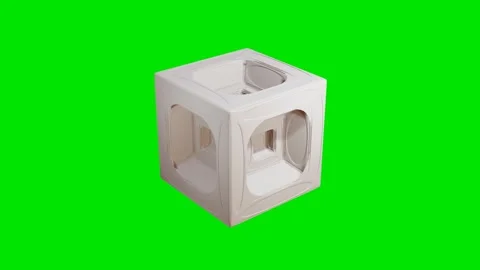 Smooth light gray cube with dents rotates on a green background. 3d render loope Video stock 312873313