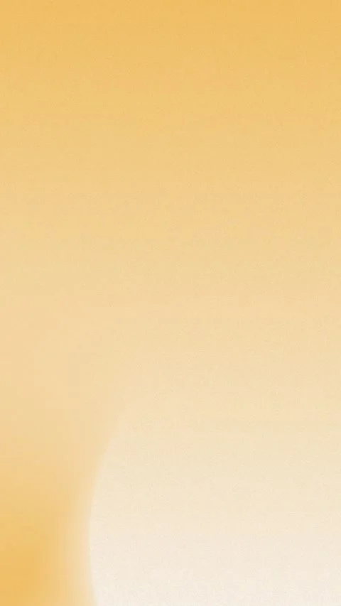 Smooth light orange gradient with subtle grain texture. Seamless loop 動画素材 310143609