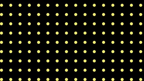 Smooth loop animation of a grid of twinkling yellow dots on a black background. Stock Footage 315777153