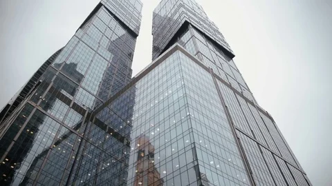 Smooth, low angle tracking shot, taken from a boat, as it rides down the Chicago Stock Footage 76615182