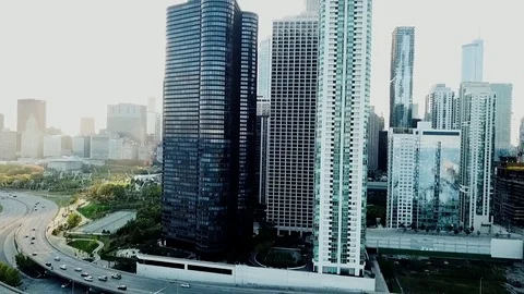 Smooth, low angle tracking shot, taken from a drone. A view of the highway that Stock Footage 83532647