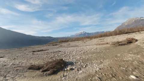 Smooth Low Flight Over a Lake and a River in Santa Croce Stock Footage 103091801