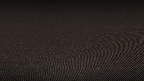 Smooth macro sweep across luxury Italian dark brown worsted wool fabric material 스톡 동영상 343211064