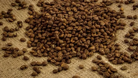 Smooth motion of roasted coffee beans. Stock Footage 135855500