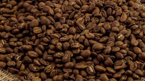 Smooth motion of roasted coffee beans. Stock Footage 135855535