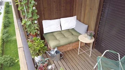 Smooth motion shot of pallet couch on balcony. Stock Footage 109377608