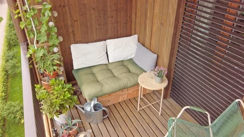 Smooth motion shot of pallet couch on balcony. Stock Footage 109379039
