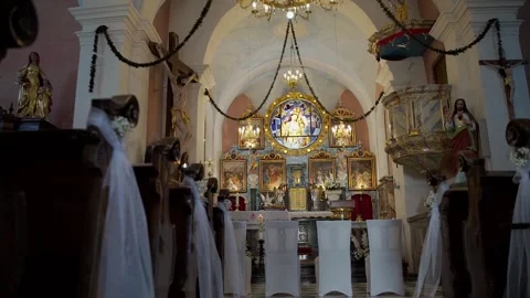 The smooth movement of the camera to the altar inside the church. The Church Stock Footage 247125014