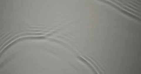 Smooth movement of liquid surface 4K. Video in loop. Stock Footage 348511039