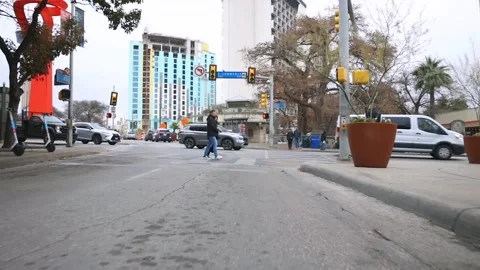 Smooth moving shot on the busy streets moving toward intersection Stock Footage 301370410