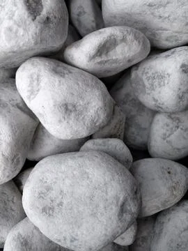 Smooth natural river pebbles background texture. Round sea rock stones top vi Foto stock