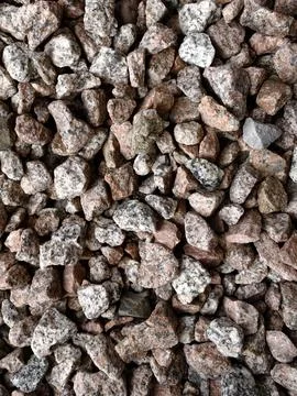 Smooth natural river pebbles background texture. Round sea rock stones top view Stock-Fotos